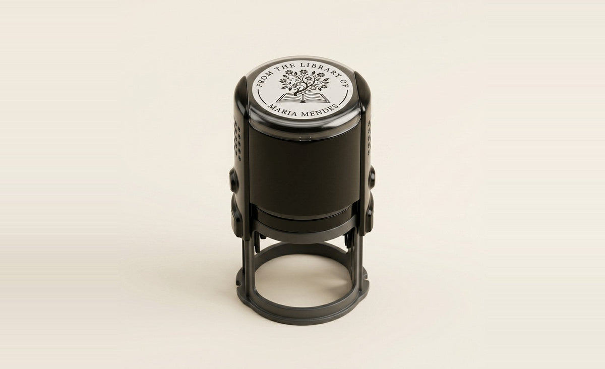 Self-inking personal library stamp reading From the Library of
