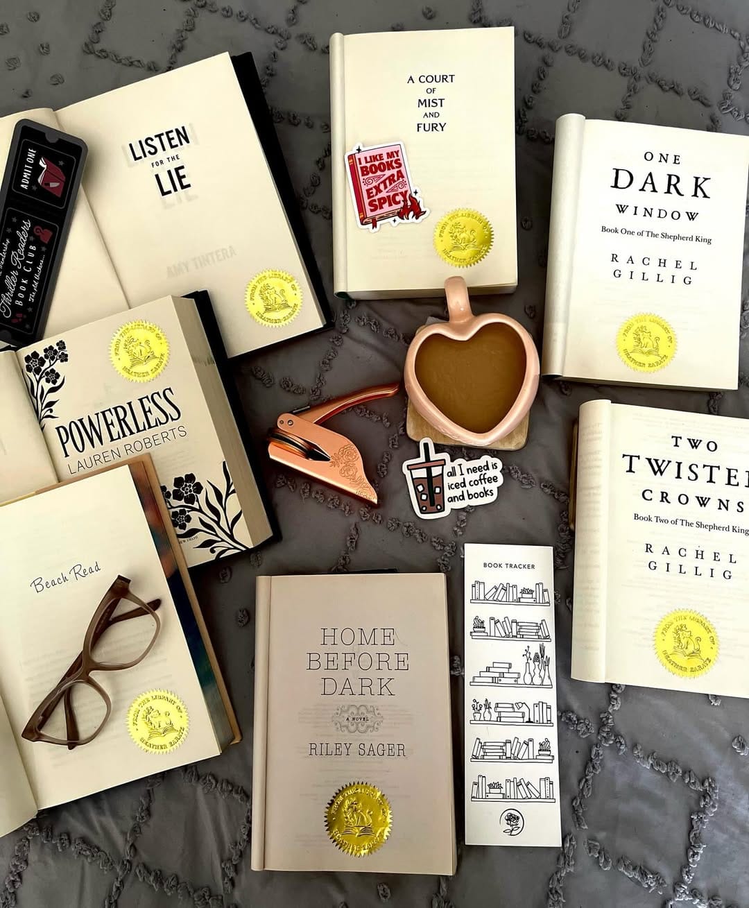 A customer holding a freshly-embossed book in a warm interior.